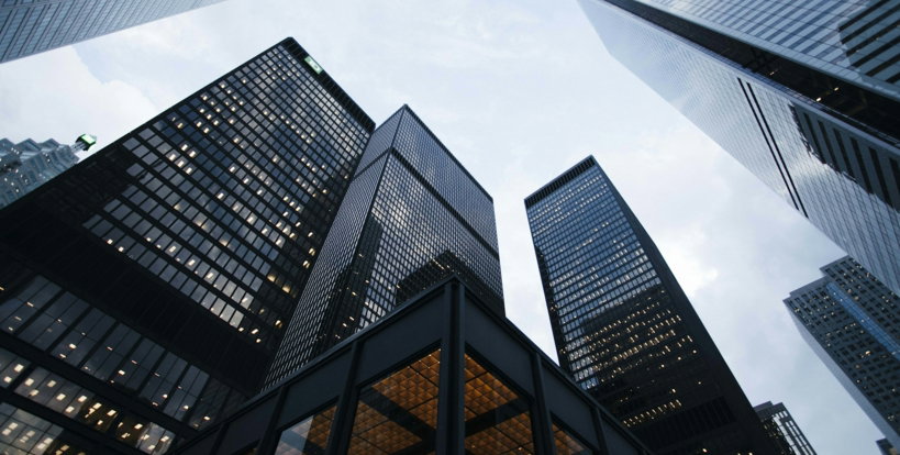 low-angle-photo-of-city-high-rise-buildings-during-daytime.jpg low angle photo of city high rise buildings during daytime